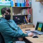 Dan sitting at a computer