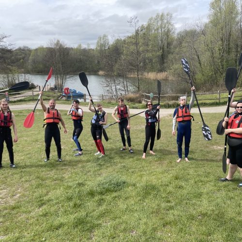 People holding paddles